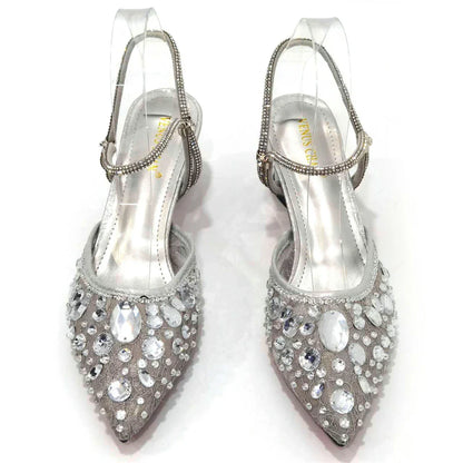 High heel green women's pumps featuring spike heels and bling fashion element for a stylish statement.