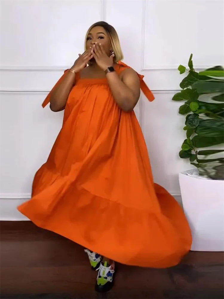 Elegant Wmstar Plus Size Maxi Dress in solid black, showcasing intricate square collar details and ankle-length design, perfect for summer occasions.