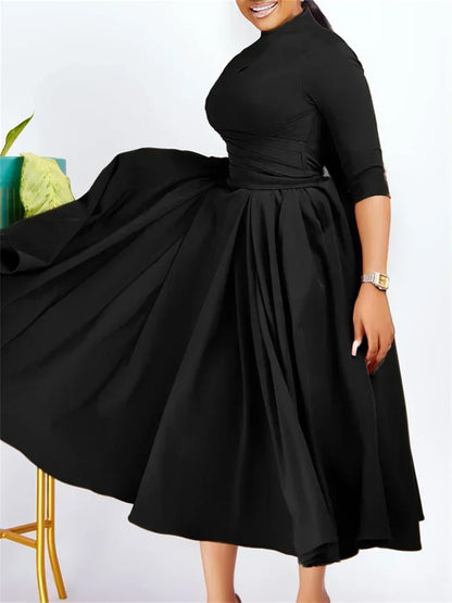 Model wearing the Wmstar Plus Size Women's African Dress, showcasing its exquisite design suitable for middle-aged women.