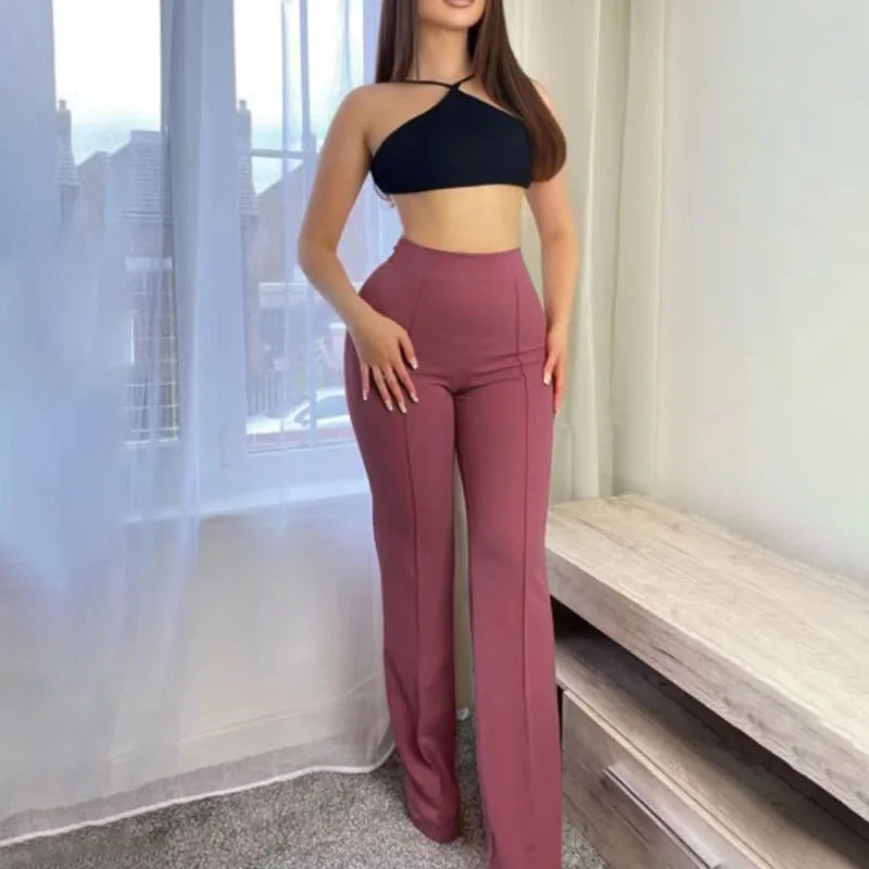 Luxurious women's flare pants in a solid colour, showcasing elegance and sophistication for any casual or formal occasion.