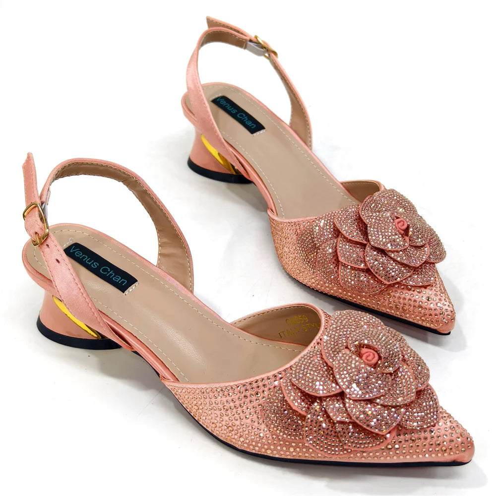 Elegant women's pointed-toe pump and bag set featuring a large flower and dazzling rhinestone detail, designed for luxury occasions and available in sizes 37-43.