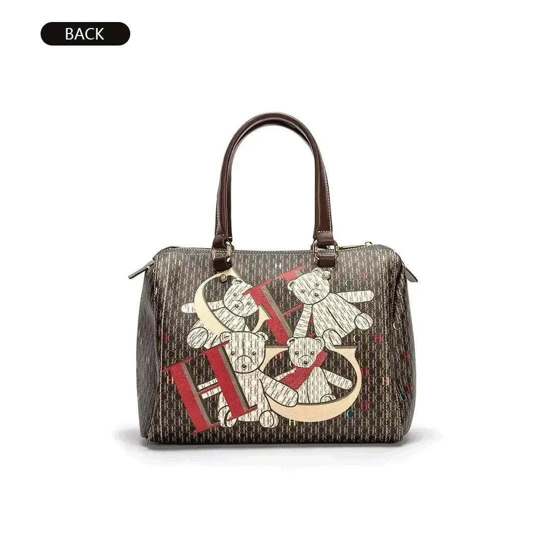 Luxurious women's commuter crossbody bag with colourful printed monogram and elegant zipper closure, perfect for casual outings.
