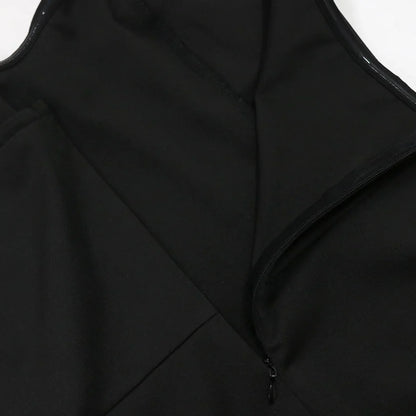 Luxurious women's jumpsuit in a solid pattern, designed with a flattering skinny fit and elegant folds, perfect for formal occasions or high street style.