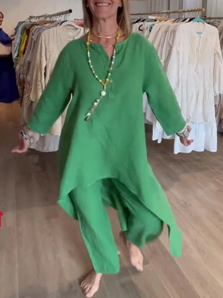 Sophisticated loose fit cotton linen suit for women in stunning pure colour, perfect for chic office attire with button decoration.