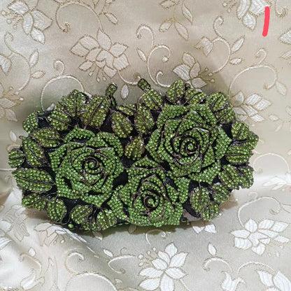 Stylish women's evening purse in metallic leather with a sophisticated minaudière shape, showcasing exquisite craftsmanship and luxury style.