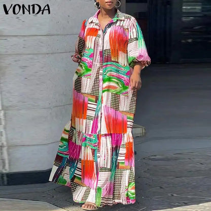 VONDA Plus Size Bohemian Maxi Dress for Women in vibrant orange and yellow prints, showcasing elegant long sleeves and a turn-down collar for a luxurious look.