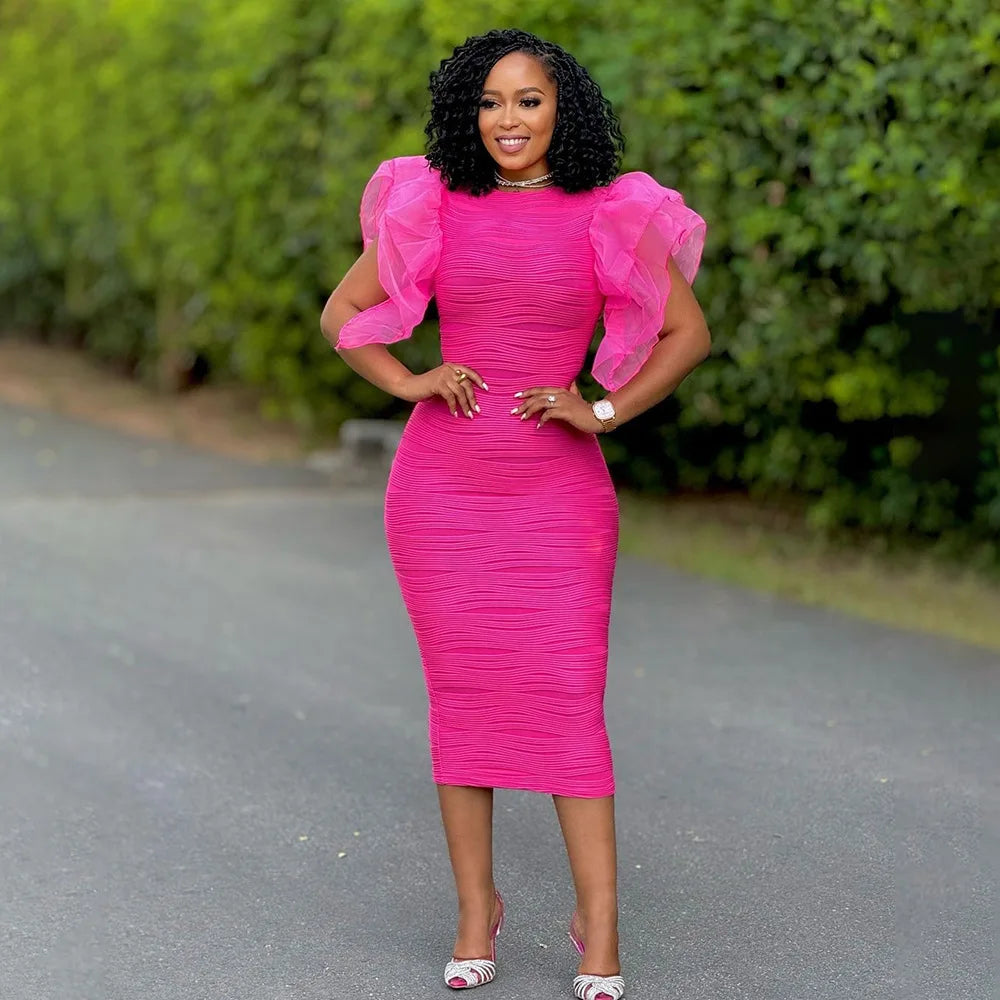 Close-up of the luxurious fabric of CM.YAYA women's striped knee-length dress with ruffles, showcasing its medium stretch polyester blend.