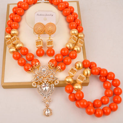 Luxurious bridal necklace from the Nigerian jewelry set, showcasing a cascade of artificial coral beads, perfect for a romantic wedding look.