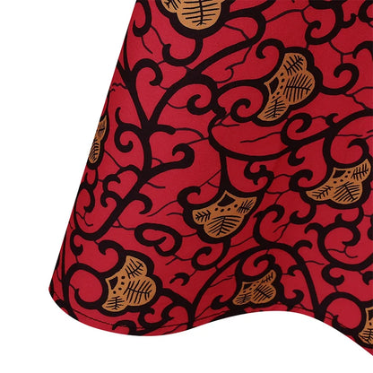 Stylish Women’s Bohemian Maxi Dress showcased in an elegant outdoor setting, highlighting its loose fit and luxurious fabric.