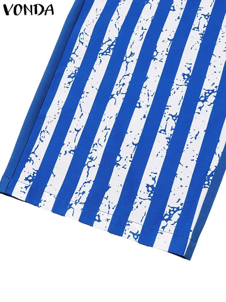 Chic and sophisticated VONDA women's 5XL casual outfit showcasing a refined V-neck long sleeve shirt with trendy polka dots and stripes, complemented by sleek elastic trousers.