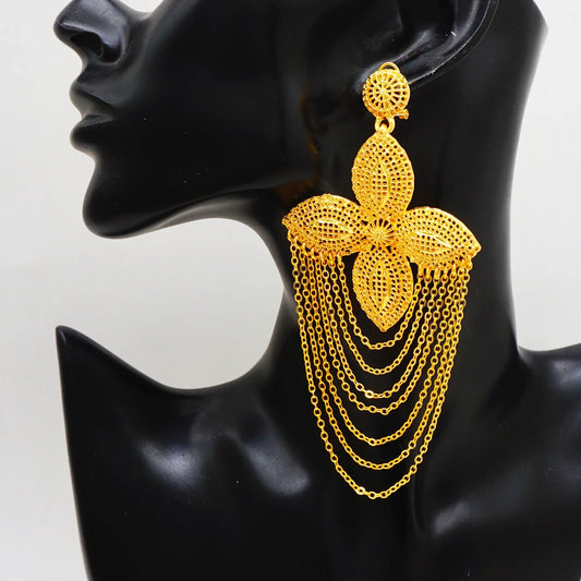 Elegant Trendy Bohemia Long Tassel Earrings for Women, featuring a geometric design and shimmering gold finish, perfect for weddings and special occasions.