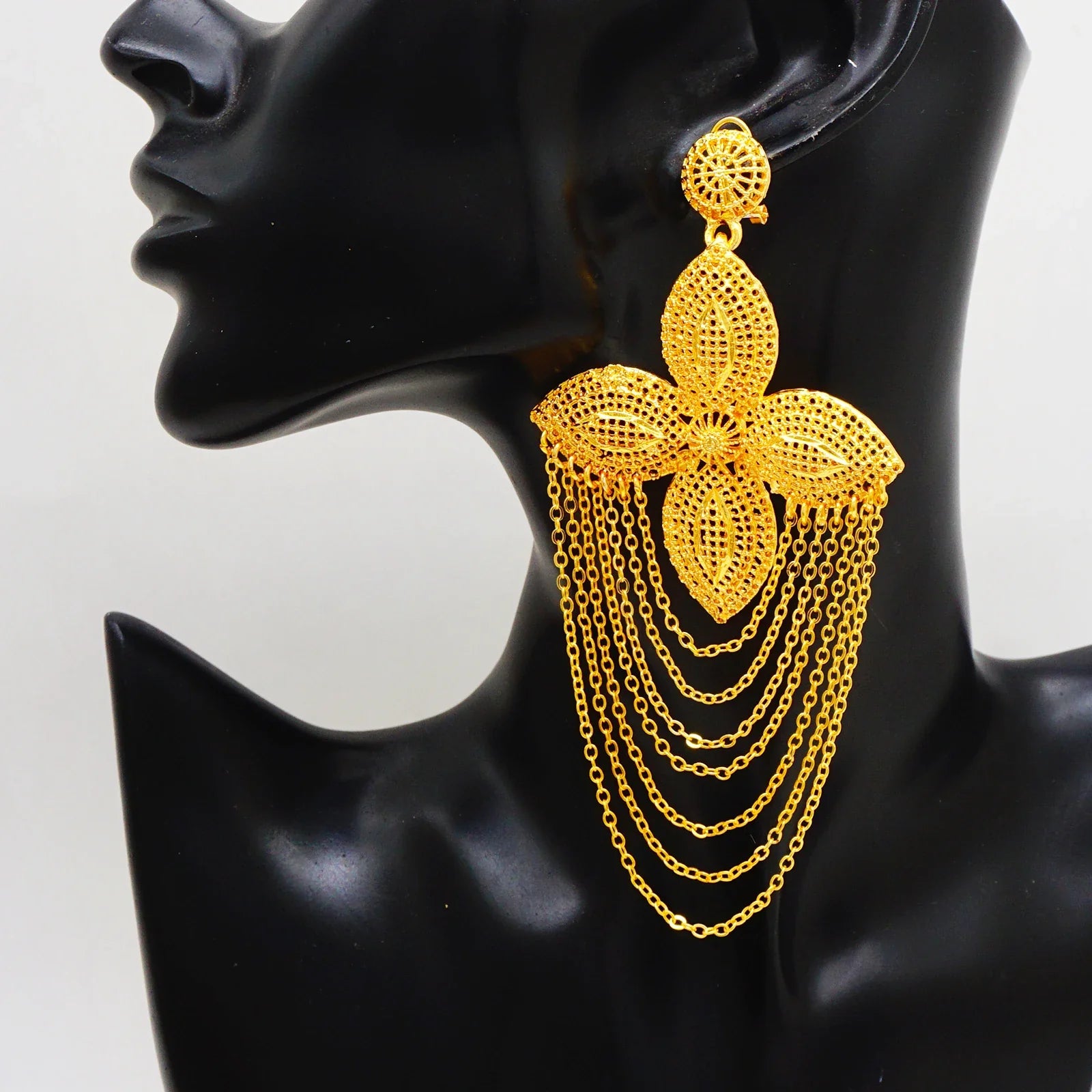 Elegant Trendy Bohemia Long Tassel Earrings for Women, featuring a geometric design and shimmering gold finish, perfect for weddings and special occasions.