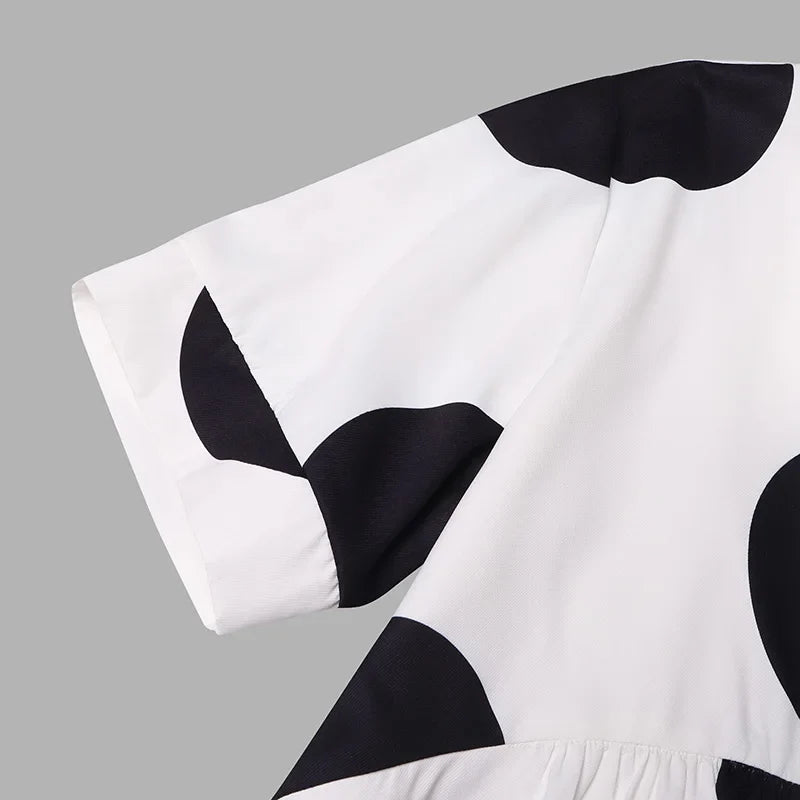 Luxurious VONDA Plus Size 5XL Bohemian Polka Dot Maxi Dress in elegant blue hue, featuring a sophisticated V-neck design ideal for summer occasions.