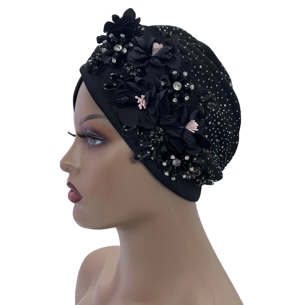 Close-up view of the elegant African turban cap indulged in sparkling rhinestones, showcasing a luxurious design ideal for all seasons.