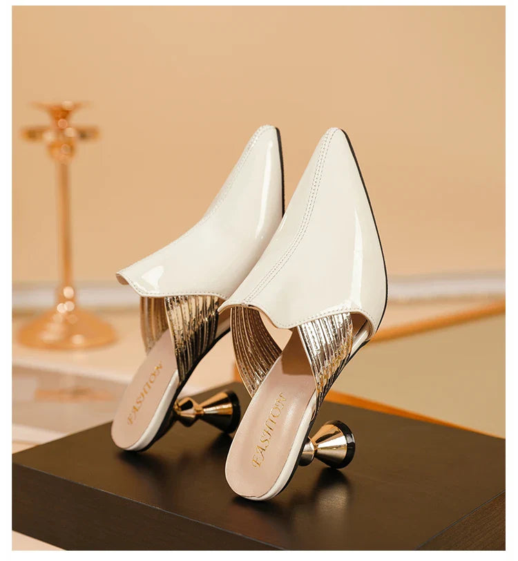 Elegant high heel slippers for women featuring pointed toe design and luxurious metal heel in classic black, ideal for summer occasions.