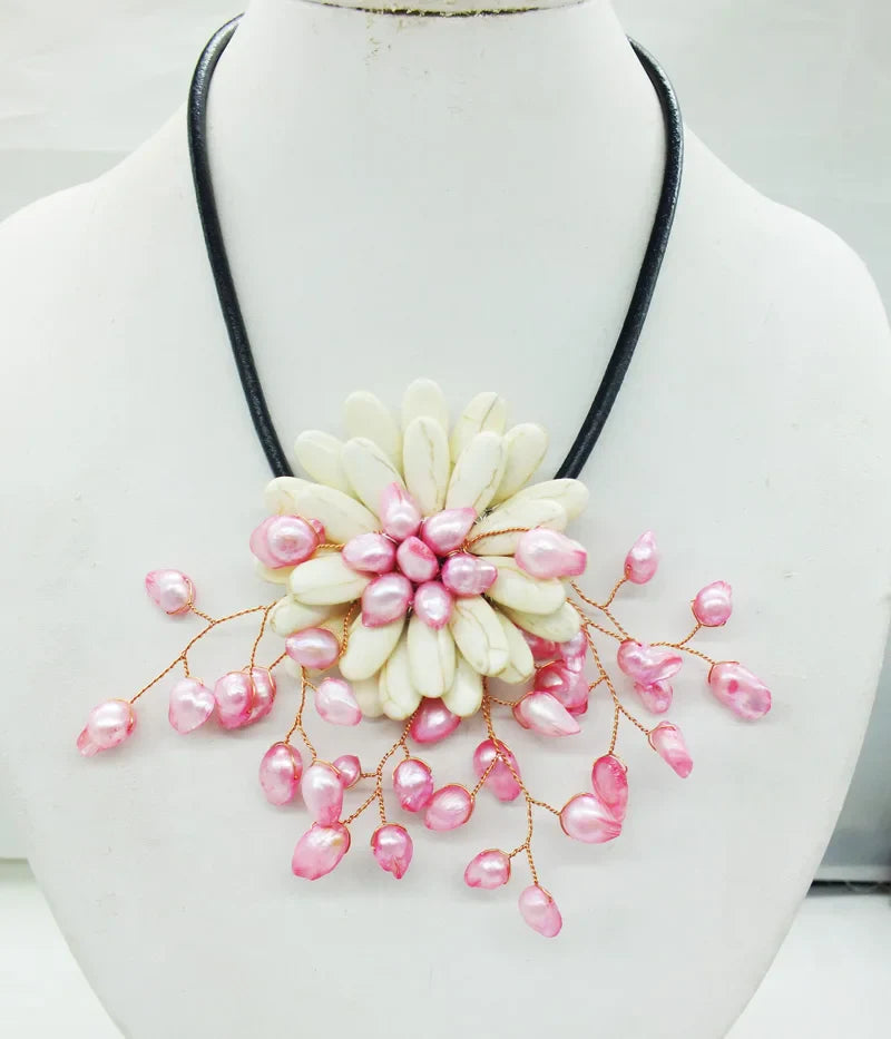 Chic and fashionable 20-inch statement necklace with intricate shell flower pattern, designed for special occasions.