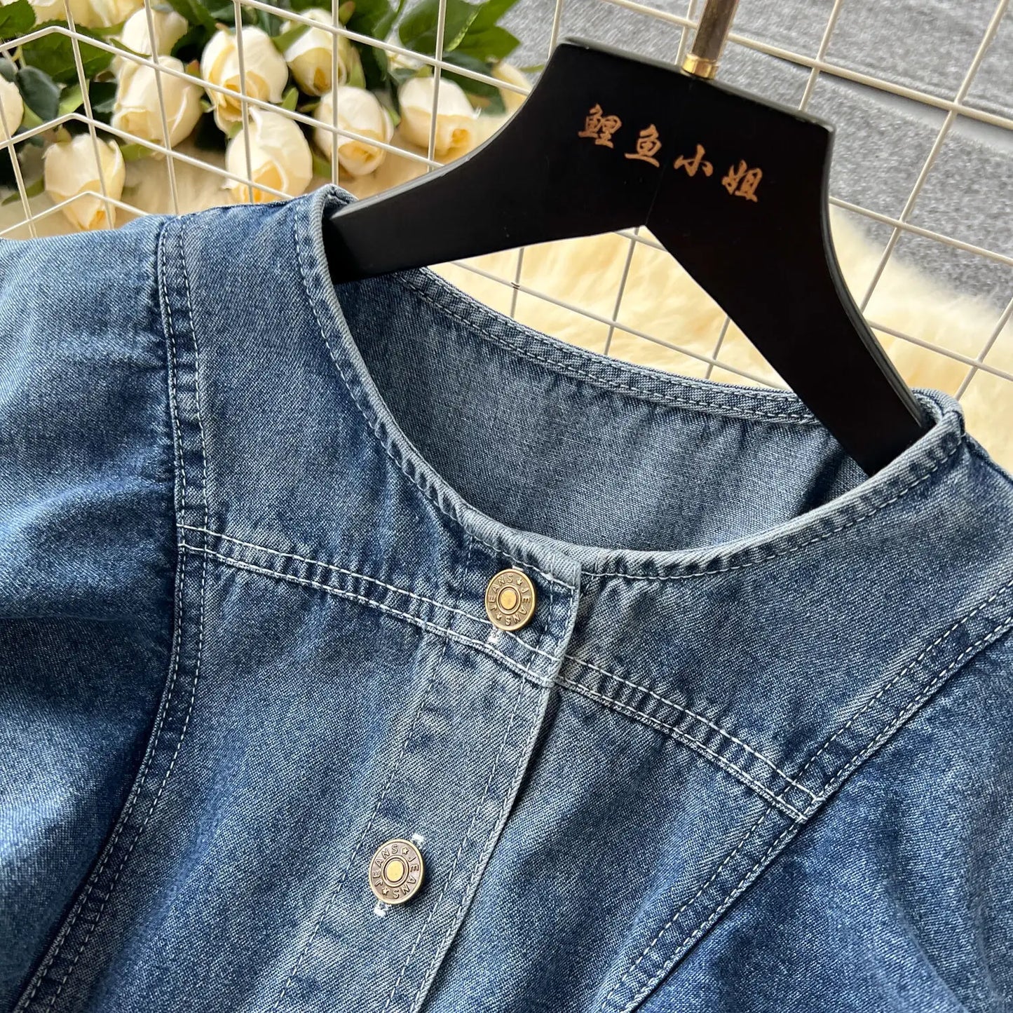 Sophisticated close-up view of the ruffled edges on WTHT Women's Sleeveless Denim Dress, highlighting exquisite craftsmanship and luxurious feel.