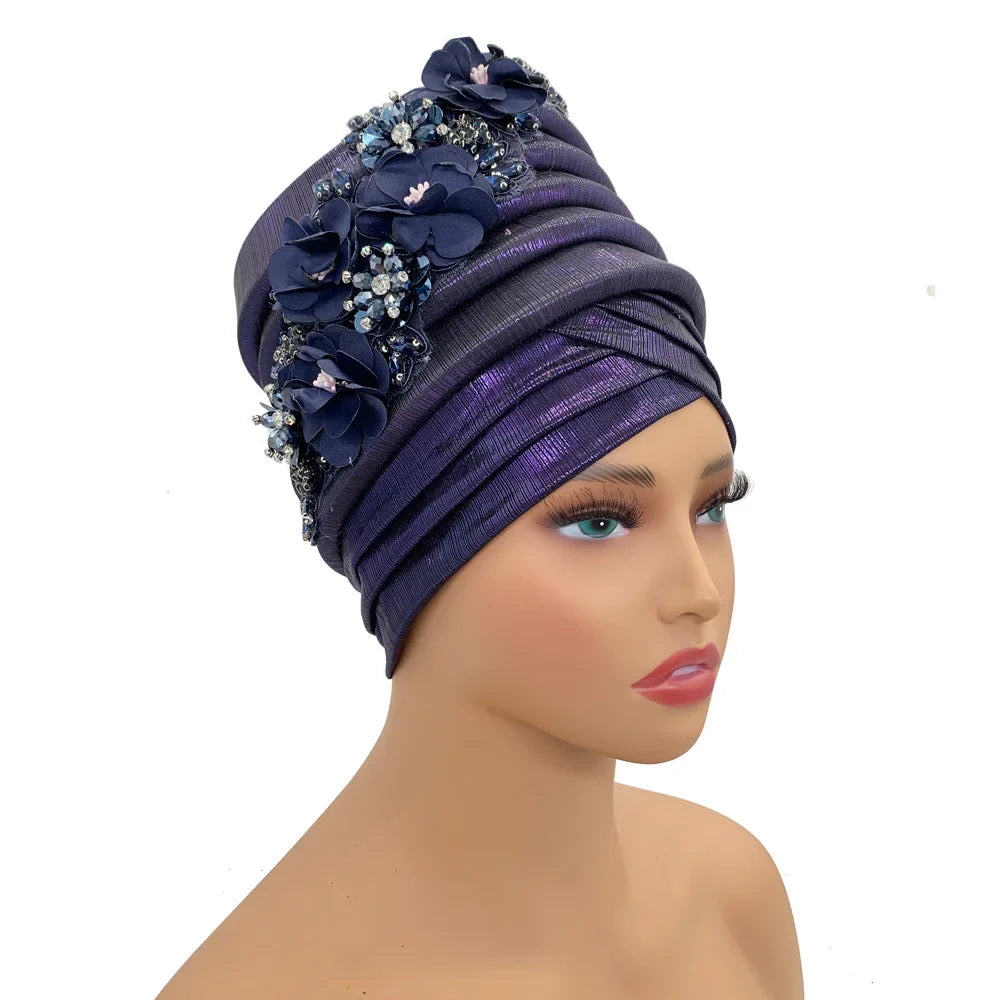 Auto Gele headtie in stunning style worn by an African woman, showcasing sophistication and grace.