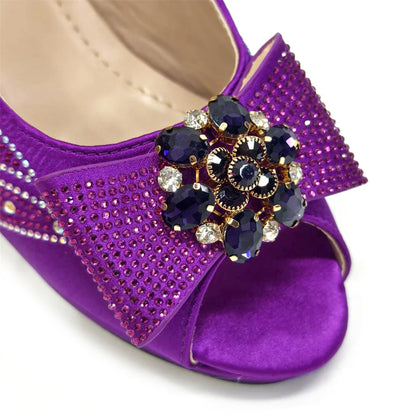 Elegant Venus Chan purple peep toe high heels adorned with rhinestones and butterfly-knot design, perfect for women's formal events.
