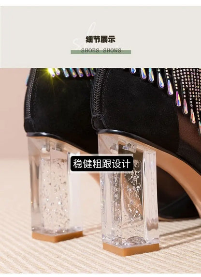 Stunning white pointed toe dance boots with delicate lace-up mesh and glamorous rhinestone tassels, a perfect blend of style and elegance for contemporary women.