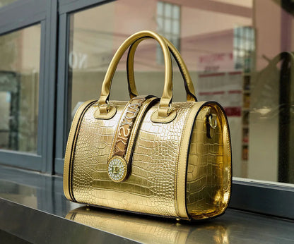 Chic and luxurious women's handbag featuring a spacious design, crafted from soft microfiber leather with a stylish animal print, perfect for any season.