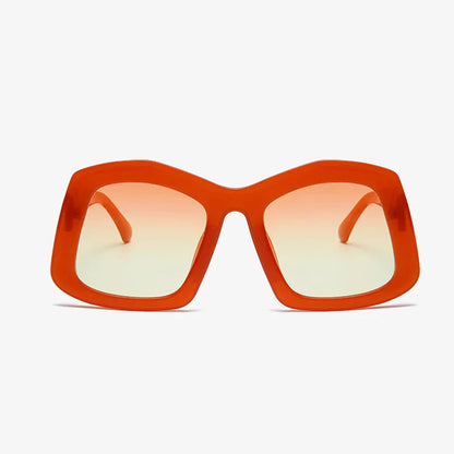 Fashionable oversized square sunglasses in orange gradient, designed for women with high UV400 protection and durable polycarbonate frame.
