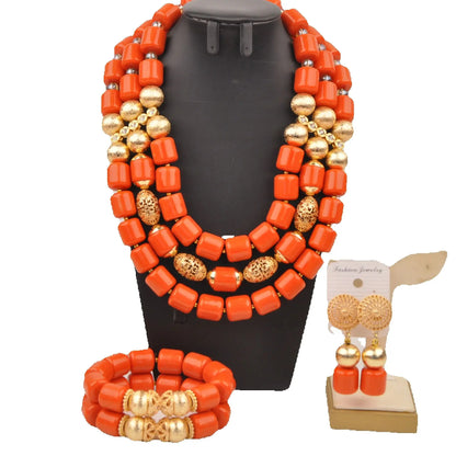 Elegant Nigerian bridal jewelry set featuring artificial coral beads, including a stunning necklace, bracelet, and earrings, perfect for weddings.