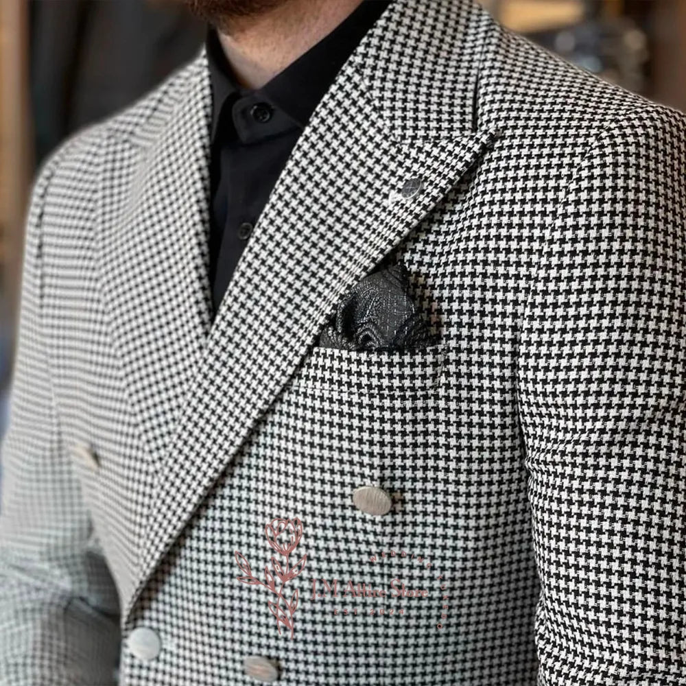 Close-up view of the luxurious fabric of the men's houndstooth jacket, showcasing its intricate weaving and high-quality polyester material.