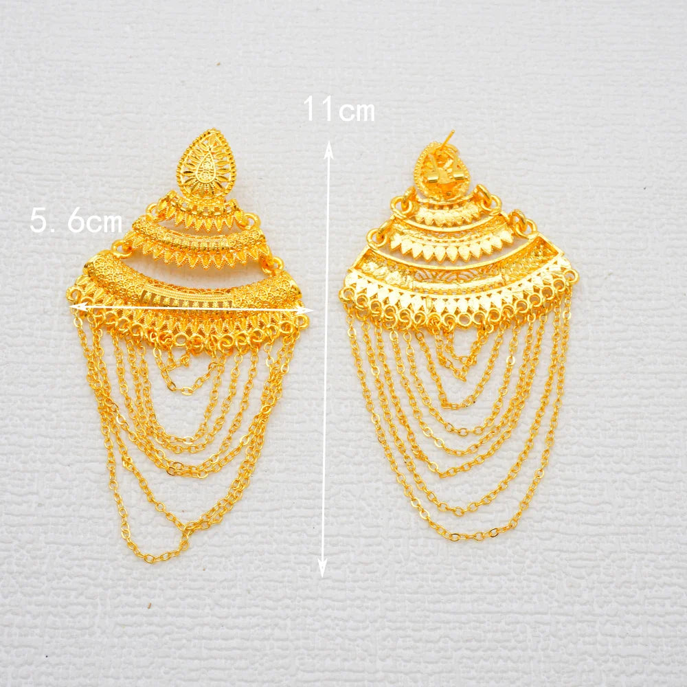 Chic copper dangle earrings with intricate geometric patterns, designed for women seeking a touch of luxury.