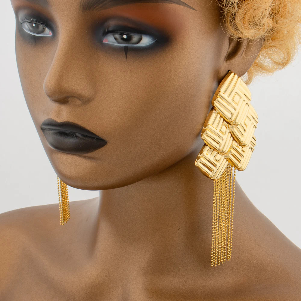 Sophisticated ethnic wedding jewelry featuring exquisite gold color tassels drop earrings, ideal for elegant events and celebrations.