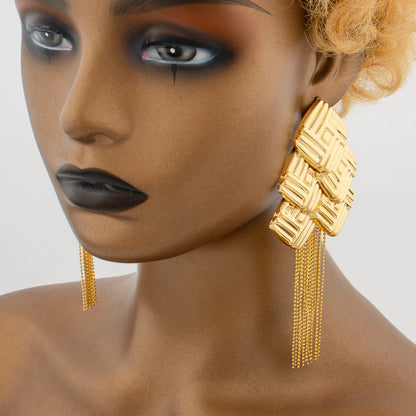 Sophisticated ethnic wedding jewelry featuring exquisite gold color tassels drop earrings, ideal for elegant events and celebrations.