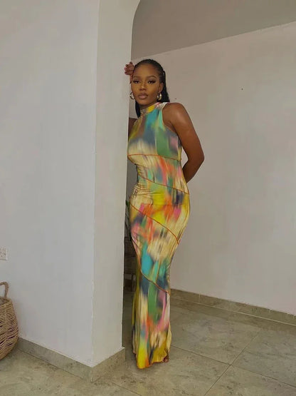 Luxurious BWQ Maxi Dress for Women featuring a vibrant tie-dye pattern and sleek asymmetrical design, perfect for streetwear style.