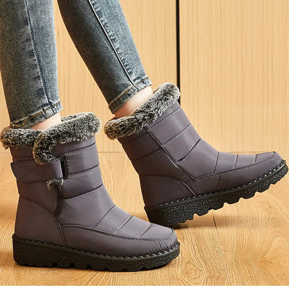 Sophisticated low-heel wedge snow boots for women in classic black, designed for both functionality and fashion in cold weather.