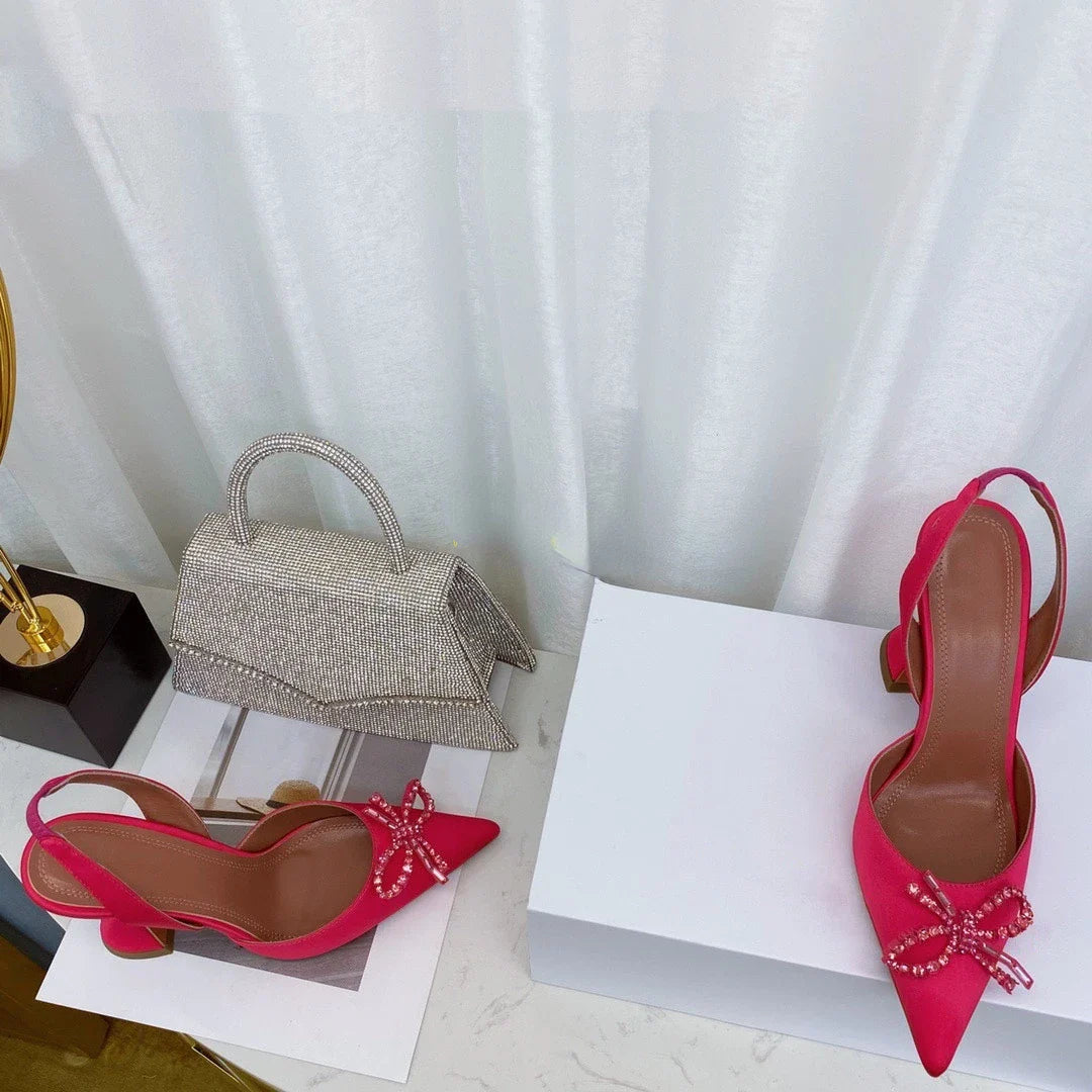 Back view of luxe women's stiletto heels, featuring a soft bonded leather insole and synthetic lining, designed for comfort and style.