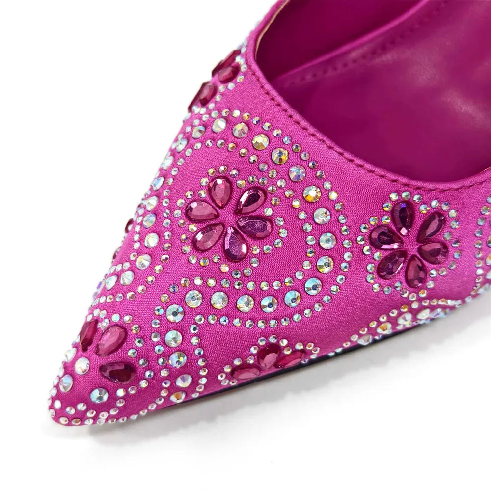 Women’s fashion pumps in fuchsia, featuring a high spike heel and refined craftsmanship, ideal for weddings and elegant events.