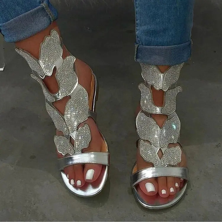 Trendy Women's Plus Size Gladiator Sandals Showcasing a Dazzling Crystal Butterfly Detail, Perfect for Effortless Summer Fashion.