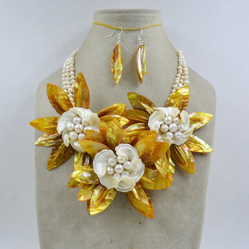 Chic 20-inch necklace with delicate shell flower motifs and crystal accents, an ideal statement piece for wedding celebrations.