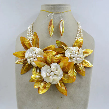 Chic 20-inch necklace with delicate shell flower motifs and crystal accents, an ideal statement piece for wedding celebrations.