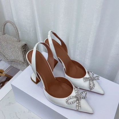 Luxury women's rhinestone bow stiletto heels sandals in elegant white, featuring a pointed toe and super high 8cm heel, perfect for stylish summer occasions.