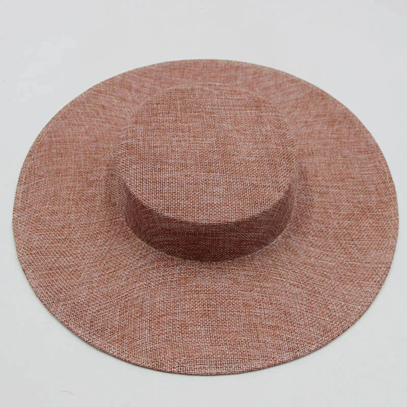 Versatile 31cm sinamay hat base for creative DIY millinery projects, combining elegance and functionality for discerning fashion enthusiasts.