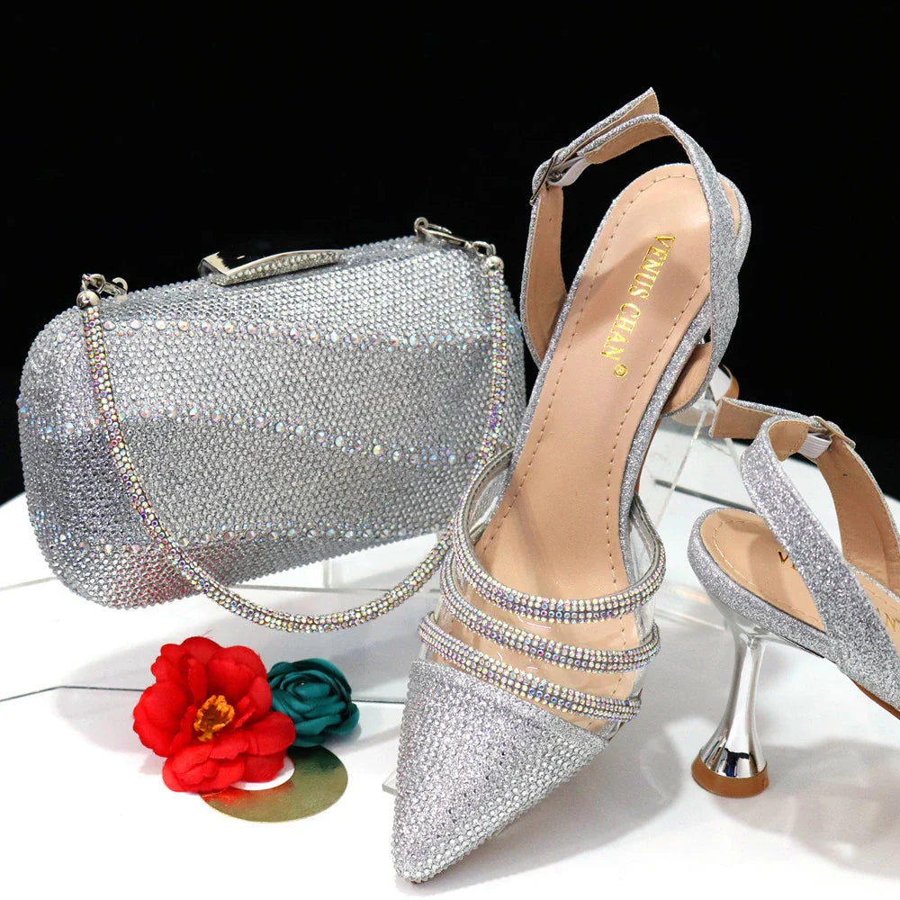Stylish matching handbag included with Venus Chan women's rhinestone accent black heels, designed for elegant occasions.