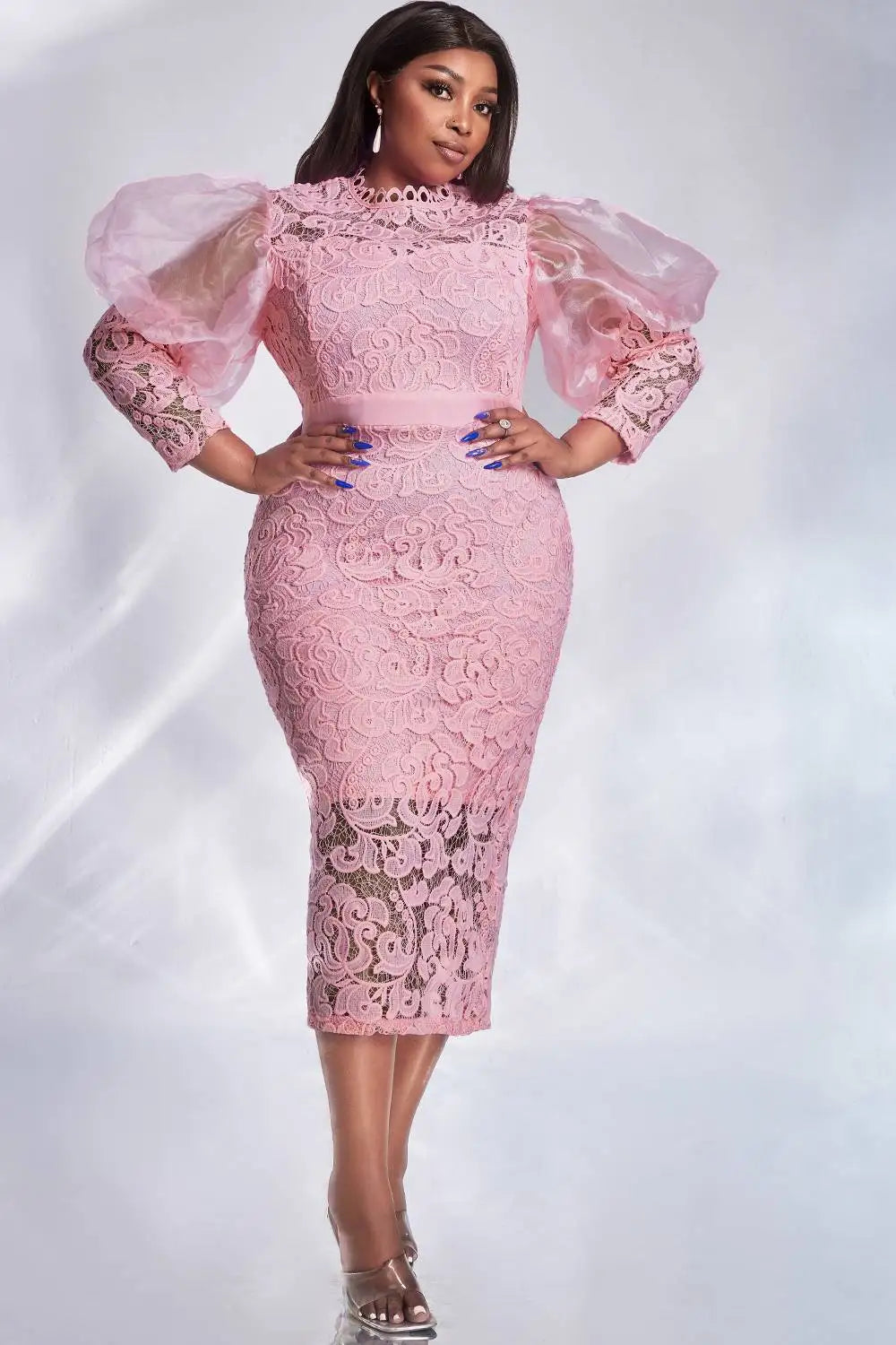 Elegant women's plus size midi dress featuring exquisite pink lace and delicate puff sleeves, perfect for cocktail occasions.