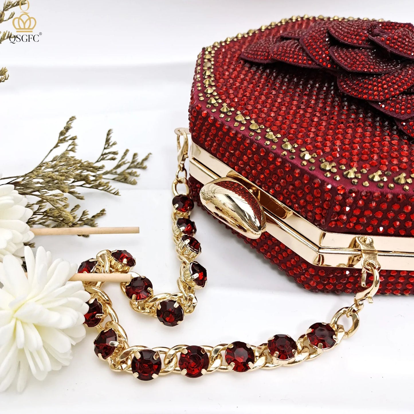 Close-up of QSGFC Women's Mid-Heel Evening Pumps featuring a stylish pointed toe design and secure buckle strap in luxurious wine colour.