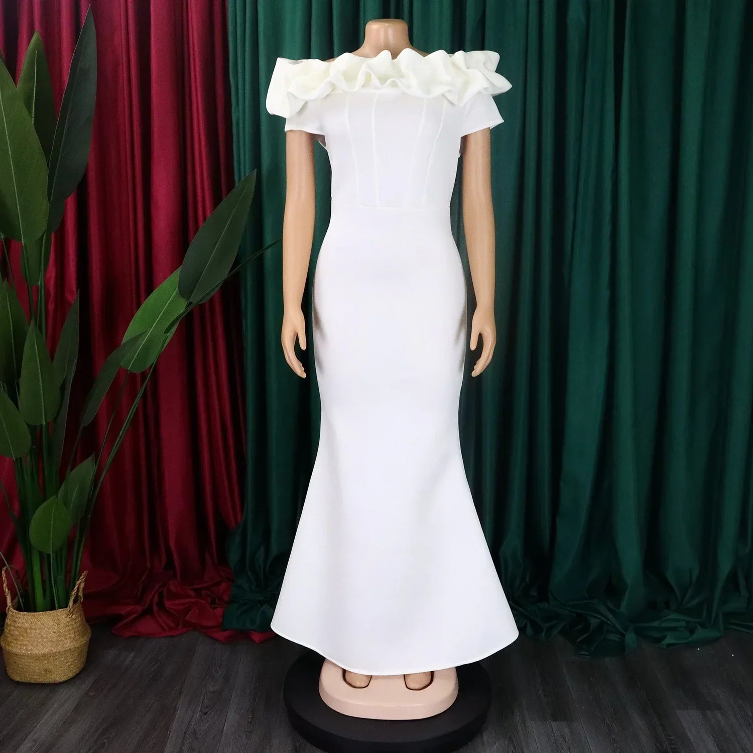 Stylish front view of a floor-length off-shoulder dress, tailored from high-quality polyester for a chic and fashionable appearance.
