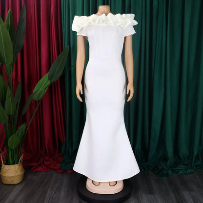 Stylish front view of a floor-length off-shoulder dress, tailored from high-quality polyester for a chic and fashionable appearance.
