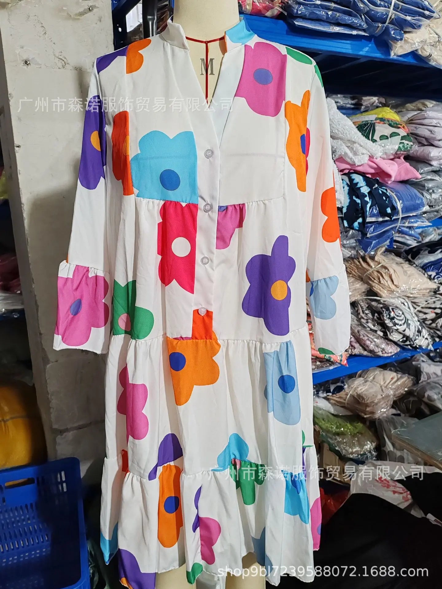 Elegant knee-length autumn jumpsuit for women with a stylish button decoration and relaxed fit.