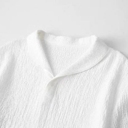 Elegant 2-piece summer men's casual suit featuring a short sleeve shirt and long pants, designed for comfort with an elastic waistband.