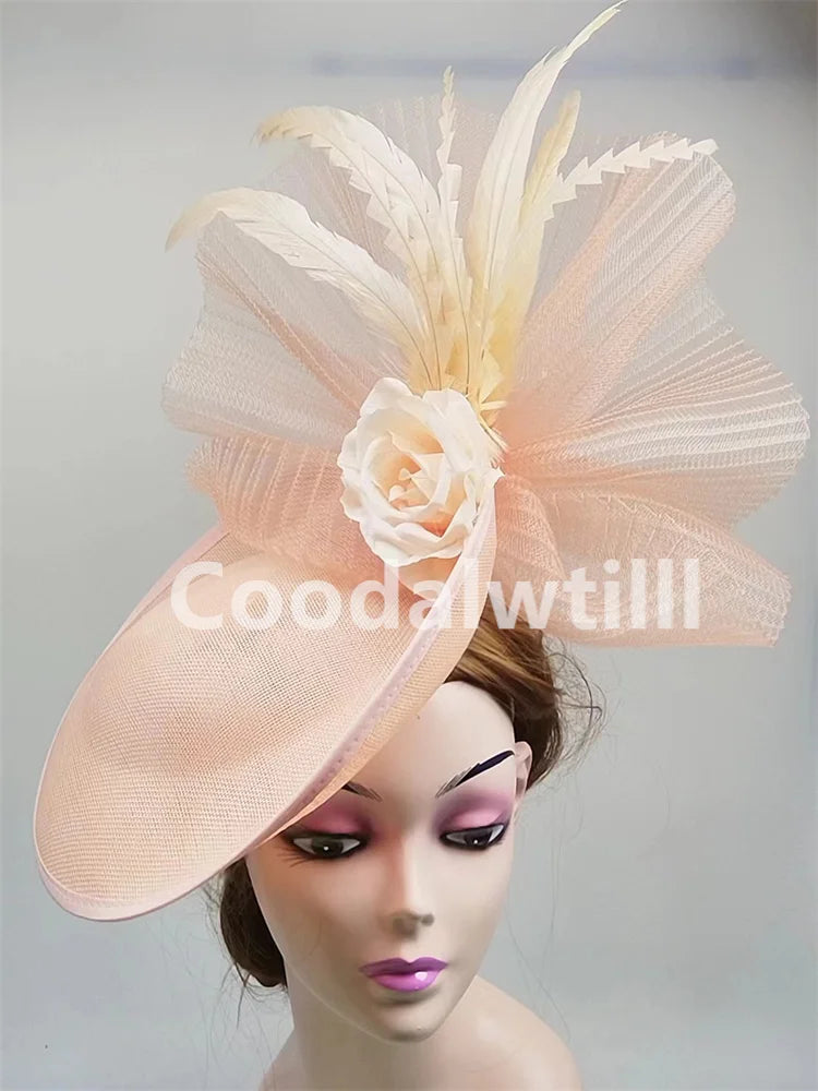 Fashionable pillbox hat featuring delicate floral details, a must-have accessory for upscale gatherings and events.