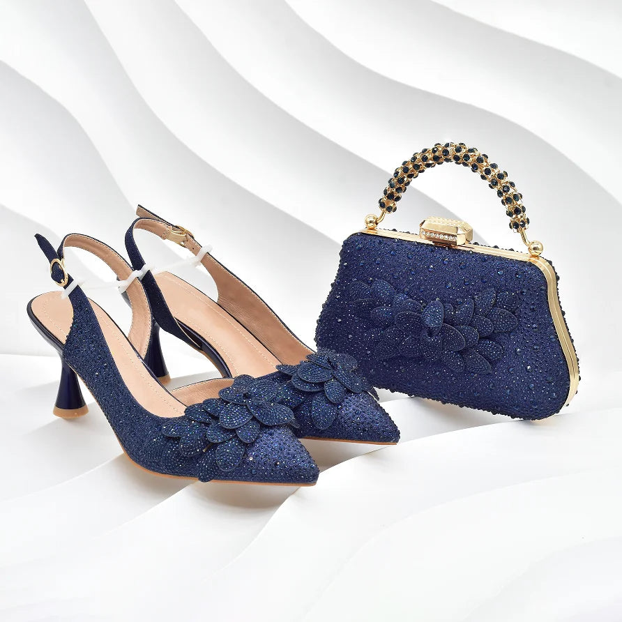 Elegant gold high heel pumps from Italy with sparkling rhinestones, complemented by a stylish designer handbag, perfect for parties and weddings.