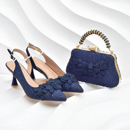 Elegant gold high heel pumps from Italy with sparkling rhinestones, complemented by a stylish designer handbag, perfect for parties and weddings.